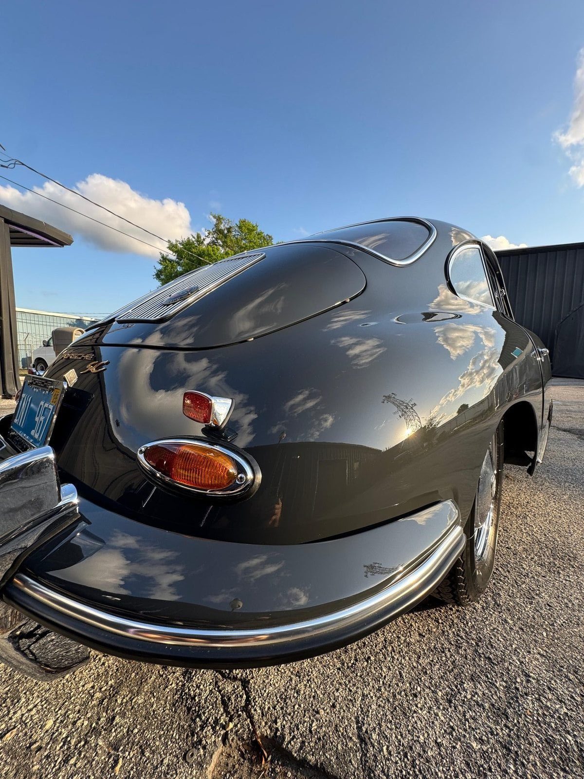 Porsche 356 SC — paint depth, sky and clouds reflected on the rear deck